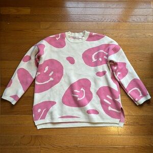 Pink smiley face sweater